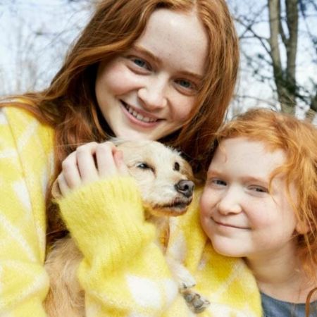 Jacey Sink having fun with her sister, Sadie Sink, and her dog